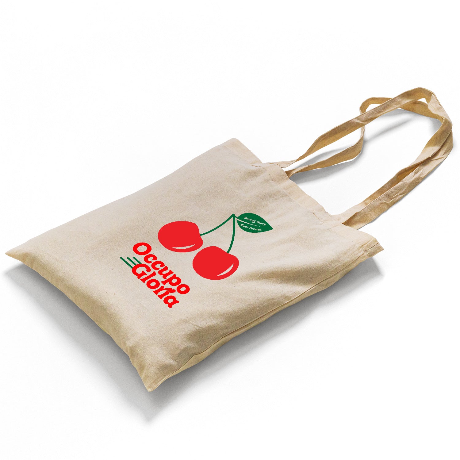 A high-quality canvas tote bag featuring the vibrant vintage cherry design. The bold print showcases a designer cherry logo with green leaves and branding, adding a retro, vintage vibe. The bag is photographed against a clean backdrop, highlighting its durability and stylish simplicity.